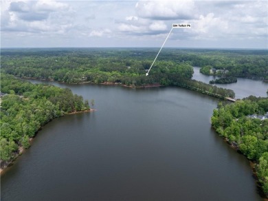 LAKEFRONT LIVING with over 180' of Lake Kedron views and on Canongate At Flat Creek Club in Georgia - for sale on GolfHomes.com, golf home, golf lot