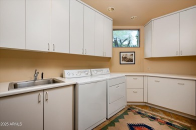 This stunning, timeless residence in Turquoise Ridge is nestled on Desert Mountain Club - Apache Golf Course in Arizona - for sale on GolfHomes.com, golf home, golf lot
