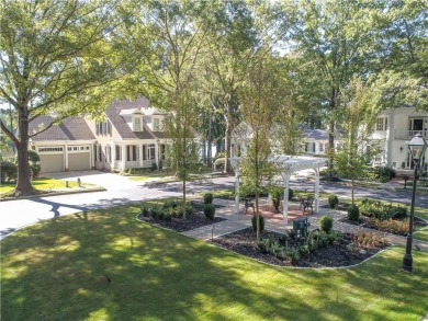 LAKEFRONT LIVING with over 180' of Lake Kedron views and on Canongate At Flat Creek Club in Georgia - for sale on GolfHomes.com, golf home, golf lot