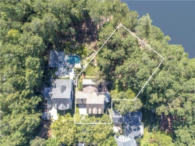 LAKEFRONT LIVING with over 180' of Lake Kedron views and on Canongate At Flat Creek Club in Georgia - for sale on GolfHomes.com, golf home, golf lot