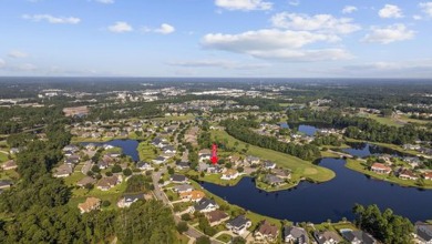 Welcome to this stunning waterfront home in the prestigious Wild on Myrtle Beach National Golf Course in South Carolina - for sale on GolfHomes.com, golf home, golf lot