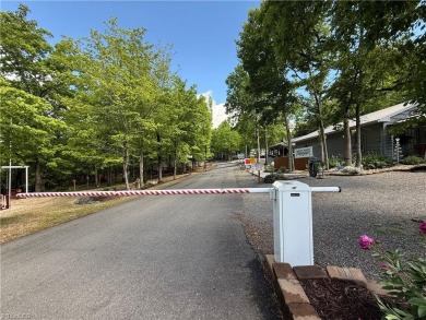 Lot #134 located in the private gated community of Greenstreet on Stone Mountain Golf Club in North Carolina - for sale on GolfHomes.com, golf home, golf lot