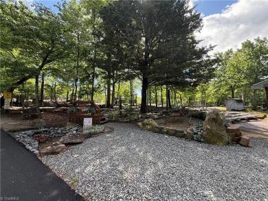 Lot #134 located in the private gated community of Greenstreet on Stone Mountain Golf Club in North Carolina - for sale on GolfHomes.com, golf home, golf lot