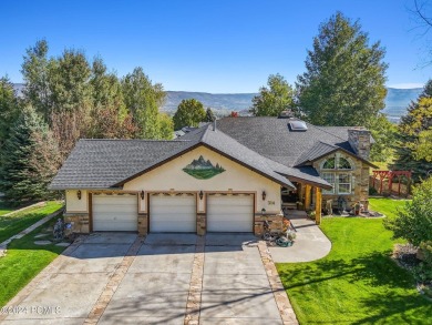 Embrace the vibrant beauty of spring and summer in this on Homestead Golf Club and Resort in Utah - for sale on GolfHomes.com, golf home, golf lot