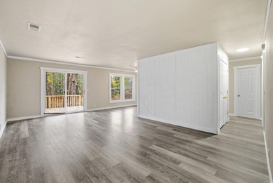 This charming, fully renovated 2-bed/1-bath townhome is ideal as on DeSoto Golf Course in Arkansas - for sale on GolfHomes.com, golf home, golf lot