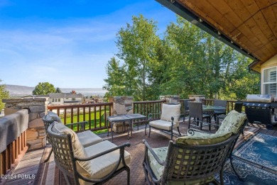 Embrace the vibrant beauty of spring and summer in this on Homestead Golf Club and Resort in Utah - for sale on GolfHomes.com, golf home, golf lot