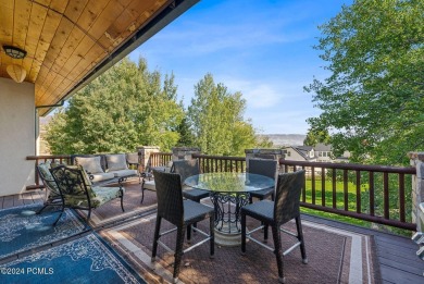 Embrace the vibrant beauty of spring and summer in this on Homestead Golf Club and Resort in Utah - for sale on GolfHomes.com, golf home, golf lot