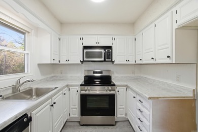 This charming, fully renovated 2-bed/1-bath townhome is ideal as on DeSoto Golf Course in Arkansas - for sale on GolfHomes.com, golf home, golf lot