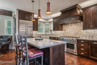 Embrace the vibrant beauty of spring and summer in this on Homestead Golf Club and Resort in Utah - for sale on GolfHomes.com, golf home, golf lot
