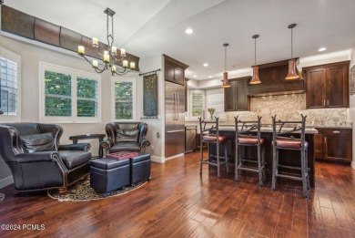 Embrace the vibrant beauty of spring and summer in this on Homestead Golf Club and Resort in Utah - for sale on GolfHomes.com, golf home, golf lot