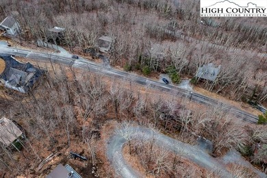 Gently sloping, road-to-road homesite located at 131 Clubhouse on Beech Mountain Club in North Carolina - for sale on GolfHomes.com, golf home, golf lot
