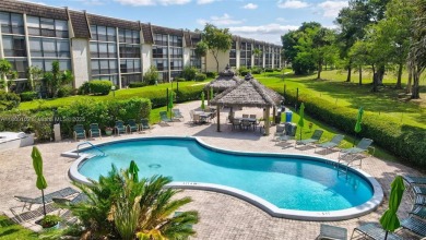 Gorgeous corner unit with stunning water views in strong condo on Inverrary Country Club in Florida - for sale on GolfHomes.com, golf home, golf lot