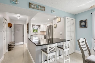 Gorgeous corner unit with stunning water views in strong condo on Inverrary Country Club in Florida - for sale on GolfHomes.com, golf home, golf lot