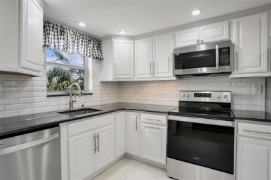 Gorgeous corner unit with stunning water views in strong condo on Inverrary Country Club in Florida - for sale on GolfHomes.com, golf home, golf lot