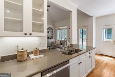 Nestled on a beautifully landscaped half-acre lot in on Chapel Hills Golf and Country Club in Georgia - for sale on GolfHomes.com, golf home, golf lot