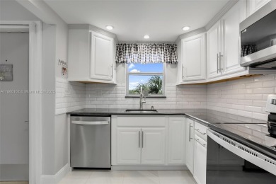 Gorgeous corner unit with stunning water views in strong condo on Inverrary Country Club in Florida - for sale on GolfHomes.com, golf home, golf lot