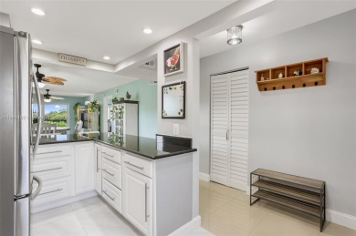 Gorgeous corner unit with stunning water views in strong condo on Inverrary Country Club in Florida - for sale on GolfHomes.com, golf home, golf lot