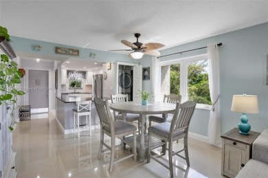 Gorgeous corner unit with stunning water views in strong condo on Inverrary Country Club in Florida - for sale on GolfHomes.com, golf home, golf lot