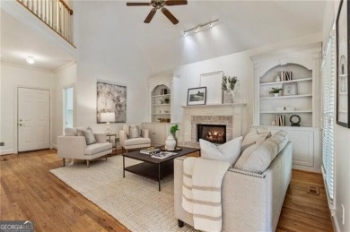 Nestled on a beautifully landscaped half-acre lot in on Chapel Hills Golf and Country Club in Georgia - for sale on GolfHomes.com, golf home, golf lot