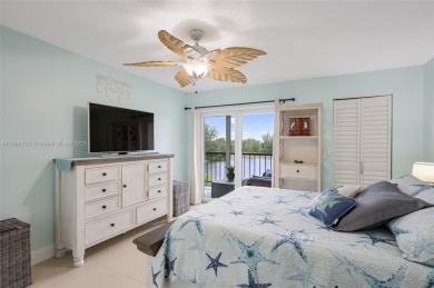 Gorgeous corner unit with stunning water views in strong condo on Inverrary Country Club in Florida - for sale on GolfHomes.com, golf home, golf lot