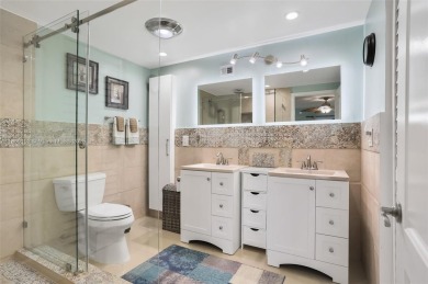 Gorgeous corner unit with stunning water views in strong condo on Inverrary Country Club in Florida - for sale on GolfHomes.com, golf home, golf lot
