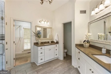 Nestled on a beautifully landscaped half-acre lot in on Chapel Hills Golf and Country Club in Georgia - for sale on GolfHomes.com, golf home, golf lot