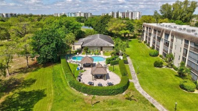 Gorgeous corner unit with stunning water views in strong condo on Inverrary Country Club in Florida - for sale on GolfHomes.com, golf home, golf lot