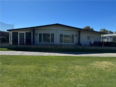 Here is your chance to buy this perfectly situated home just on Highland Springs Village Golf Course in California - for sale on GolfHomes.com, golf home, golf lot