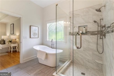 Nestled on a beautifully landscaped half-acre lot in on Chapel Hills Golf and Country Club in Georgia - for sale on GolfHomes.com, golf home, golf lot