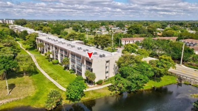 Gorgeous corner unit with stunning water views in strong condo on Inverrary Country Club in Florida - for sale on GolfHomes.com, golf home, golf lot