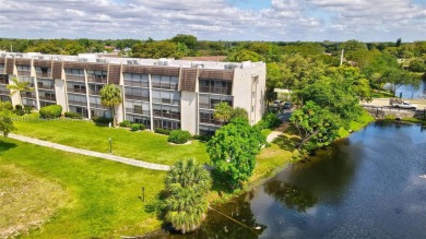 Gorgeous corner unit with stunning water views in strong condo on Inverrary Country Club in Florida - for sale on GolfHomes.com, golf home, golf lot