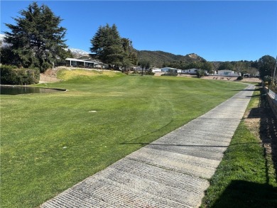 Here is your chance to buy this perfectly situated home just on Highland Springs Village Golf Course in California - for sale on GolfHomes.com, golf home, golf lot