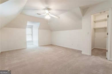 Nestled on a beautifully landscaped half-acre lot in on Chapel Hills Golf and Country Club in Georgia - for sale on GolfHomes.com, golf home, golf lot