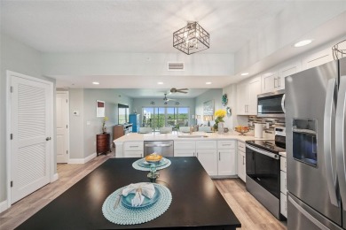 Welcome to this beautifully updated 2-bedroom, 2-bathroom condo on East Bay Golf Club in Florida - for sale on GolfHomes.com, golf home, golf lot