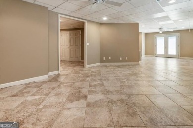 Nestled on a beautifully landscaped half-acre lot in on Chapel Hills Golf and Country Club in Georgia - for sale on GolfHomes.com, golf home, golf lot