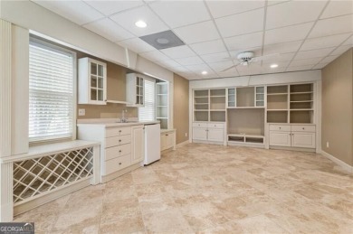 Nestled on a beautifully landscaped half-acre lot in on Chapel Hills Golf and Country Club in Georgia - for sale on GolfHomes.com, golf home, golf lot