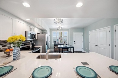Welcome to this beautifully updated 2-bedroom, 2-bathroom condo on East Bay Golf Club in Florida - for sale on GolfHomes.com, golf home, golf lot