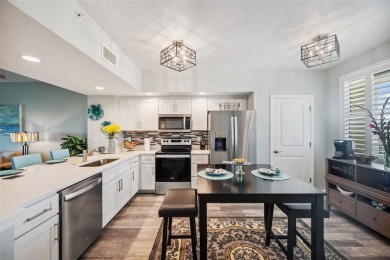 Welcome to this beautifully updated 2-bedroom, 2-bathroom condo on East Bay Golf Club in Florida - for sale on GolfHomes.com, golf home, golf lot