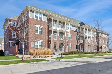 Discover this inviting 3-bedroom, 2-bath condo on the third on Elks Lodge 590 in Iowa - for sale on GolfHomes.com, golf home, golf lot