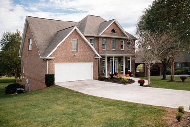 Check out this stunning brick estate perfectly situated on the on Crooked Creek Golf Club in Kentucky - for sale on GolfHomes.com, golf home, golf lot