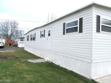 Welcome to this stunning 2 bedroom, 1 bath manufactured home on Erie Shores Golf Course in Ohio - for sale on GolfHomes.com, golf home, golf lot