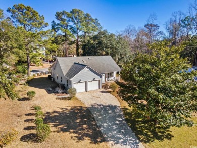 What a lovely home this one is, and it's just minutes from the on Pawleys Plantation Golf and Country Club in South Carolina - for sale on GolfHomes.com, golf home, golf lot