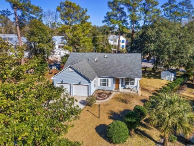 What a lovely home this one is, and it's just minutes from the on Pawleys Plantation Golf and Country Club in South Carolina - for sale on GolfHomes.com, golf home, golf lot