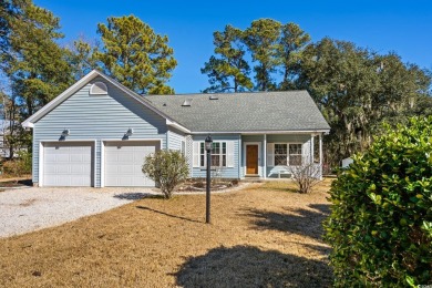 What a lovely home this one is, and it's just minutes from the on Pawleys Plantation Golf and Country Club in South Carolina - for sale on GolfHomes.com, golf home, golf lot