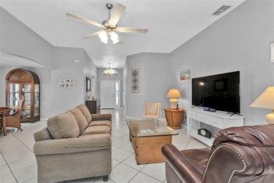 NEAT AS A PIN Sheffield home on LARGE corner lot in the gated on Kings Gate Golf Club in Florida - for sale on GolfHomes.com, golf home, golf lot
