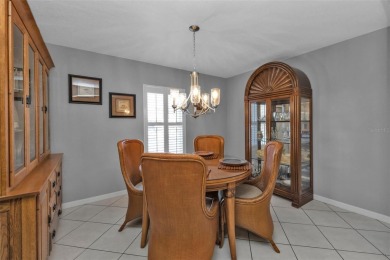 NEAT AS A PIN Sheffield home on LARGE corner lot in the gated on Kings Gate Golf Club in Florida - for sale on GolfHomes.com, golf home, golf lot