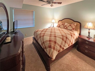 This charming end unit boasts an abundance of natural light and on Kings Point Golf -Flanders Way in Florida - for sale on GolfHomes.com, golf home, golf lot