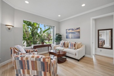 Welcome to timeless elegance and thoughtful design in this on The Grand Club Cypress Course in Florida - for sale on GolfHomes.com, golf home, golf lot