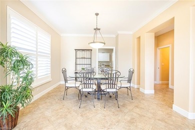 Discover exceptional value in this true four-bedroom residence on The Colony Golf and Country Club in Florida - for sale on GolfHomes.com, golf home, golf lot