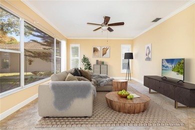 Discover exceptional value in this true four-bedroom residence on The Colony Golf and Country Club in Florida - for sale on GolfHomes.com, golf home, golf lot